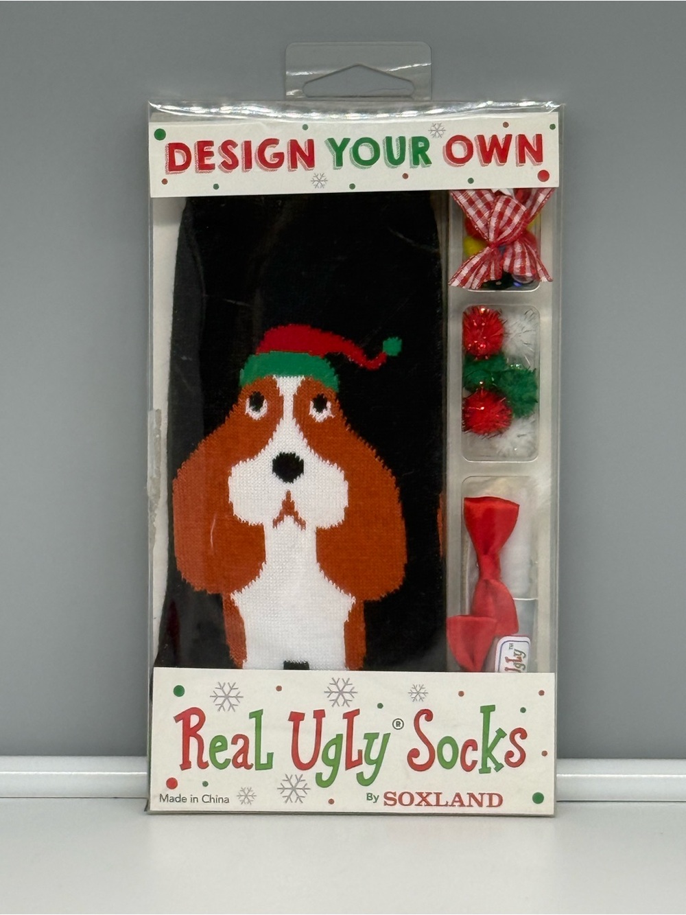 Soxland "Design Your Own Real Ugly Socks" kit featuring a Basset Hound dog chara